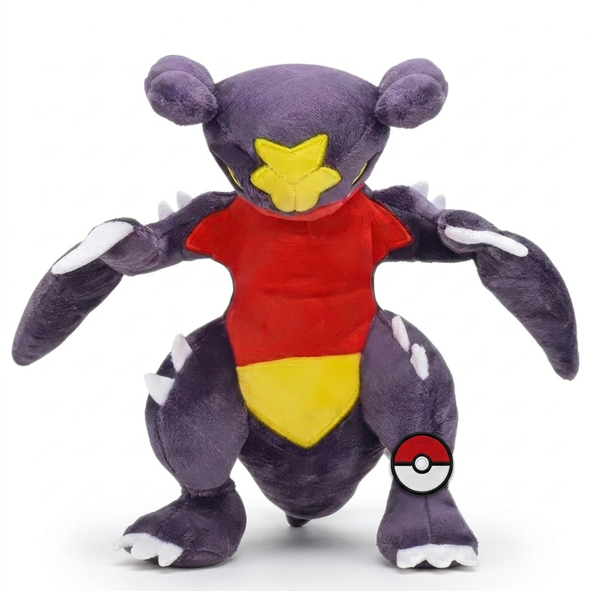 Peluche Carchacrok avec badge prouvant l'authenticité du produit.