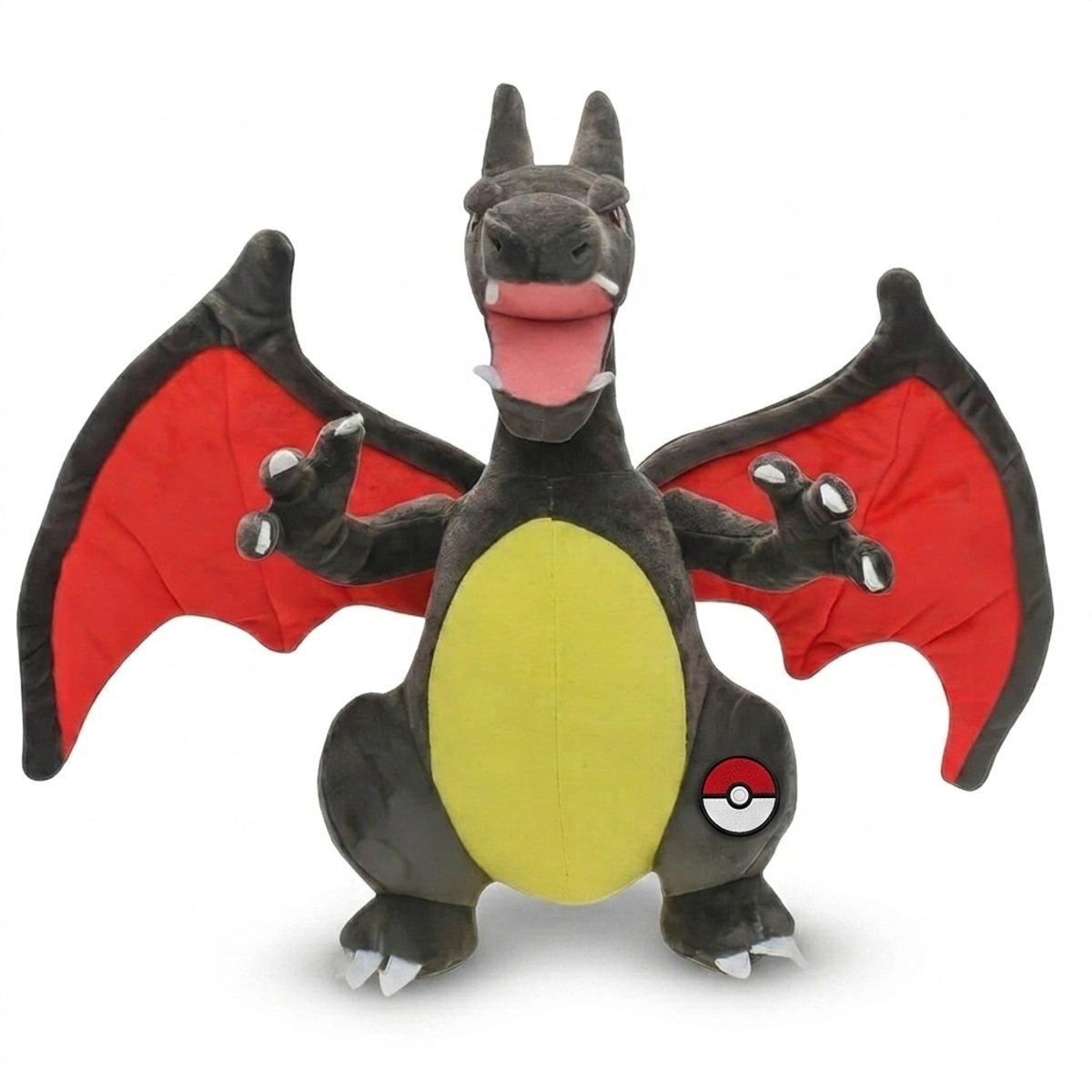 Peluche Dracaufeu avec badge prouvant l'authenticité du produit.