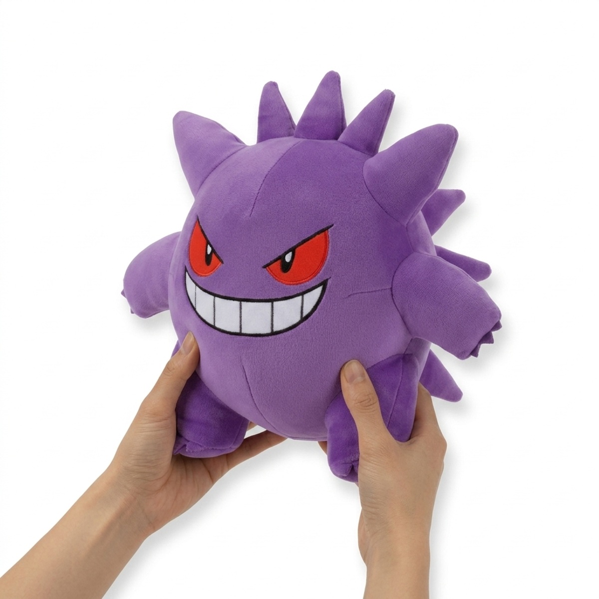 Peluche Ectoplasma tenue dans les mains