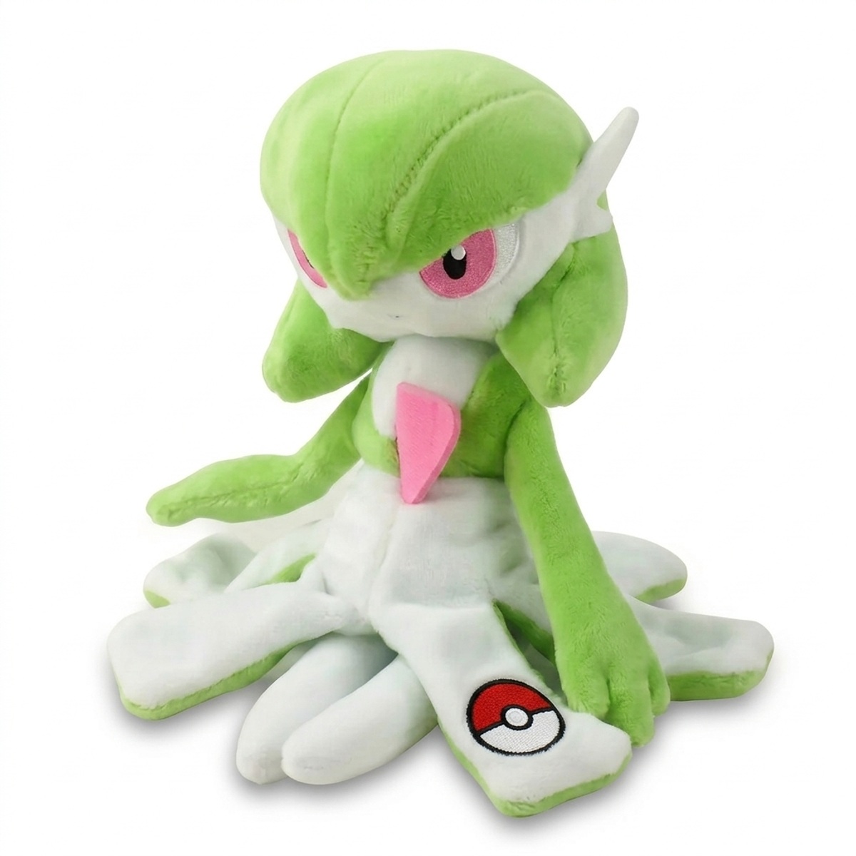 Peluche Gardevoir avec badge prouvant l'authenticité du produit.