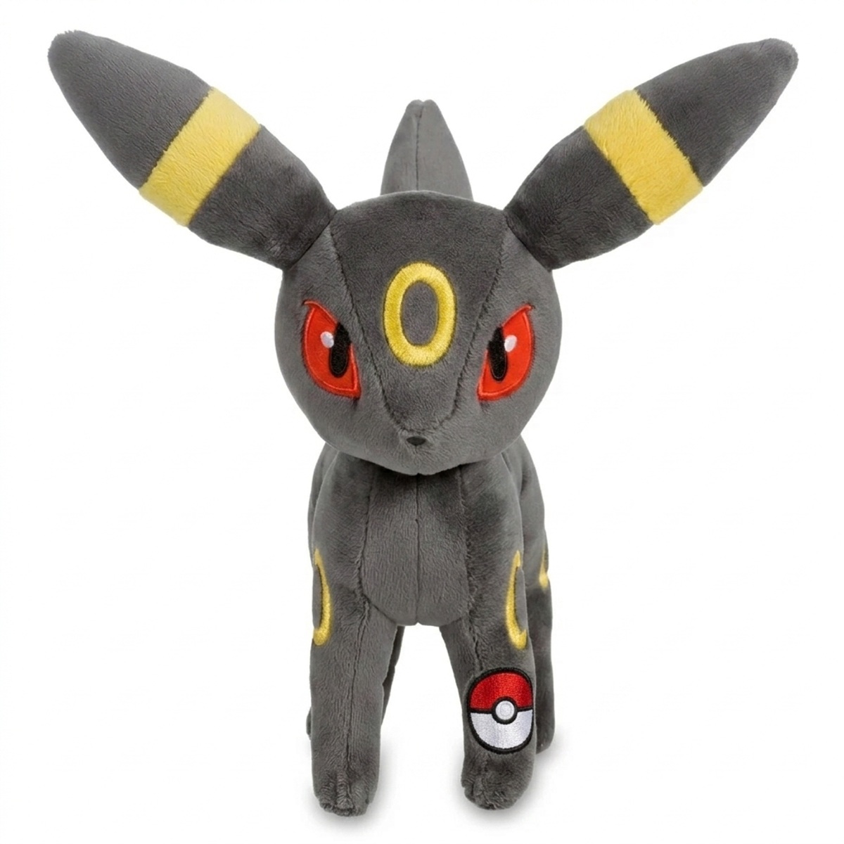 Peluche Noctali avec badge prouvant l'authenticité du produit.