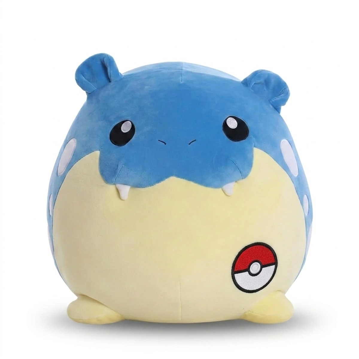 Peluche Obalie avec badge prouvant l'authenticité du produit.