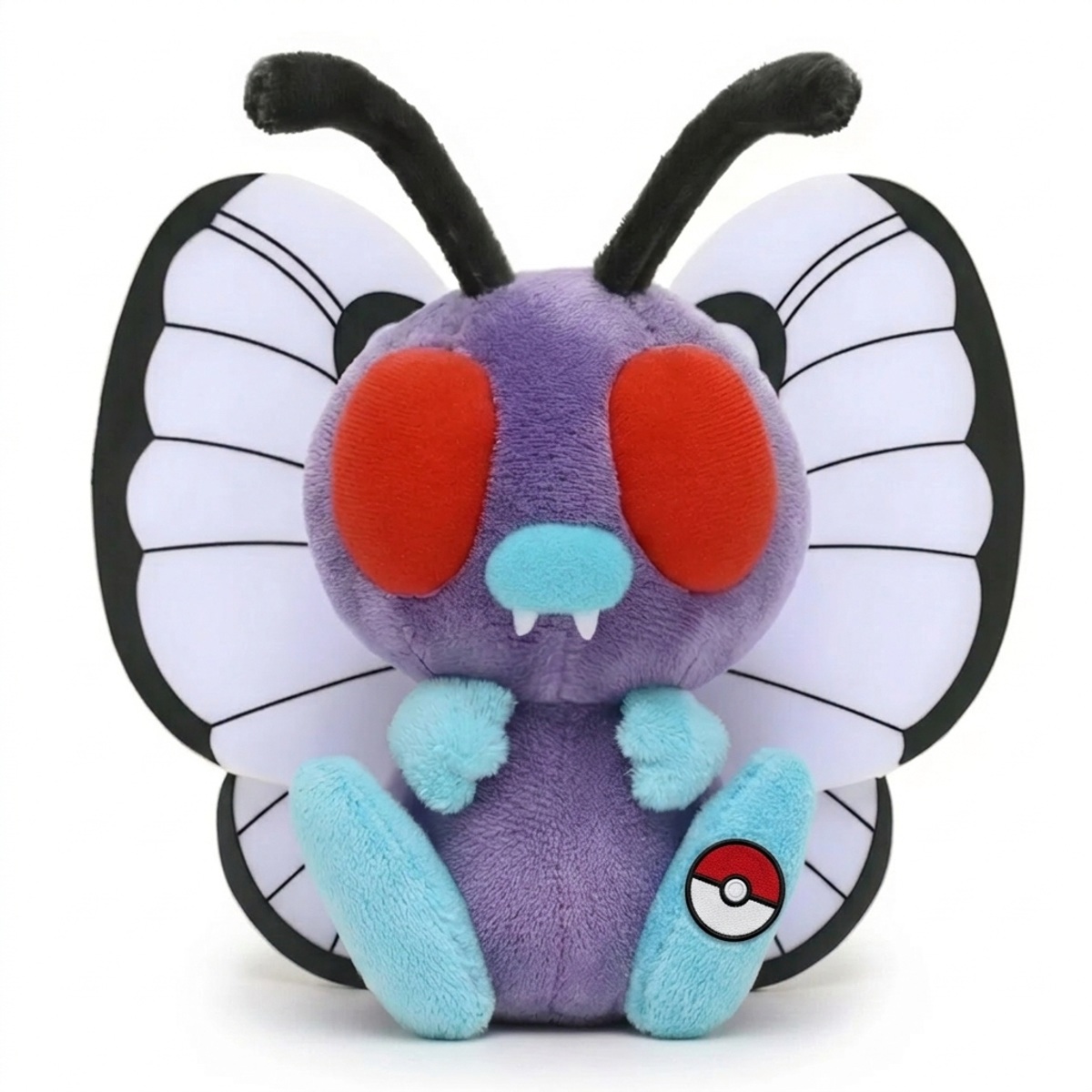Peluche Papilusion avec badge prouvant l'authenticité du produit.