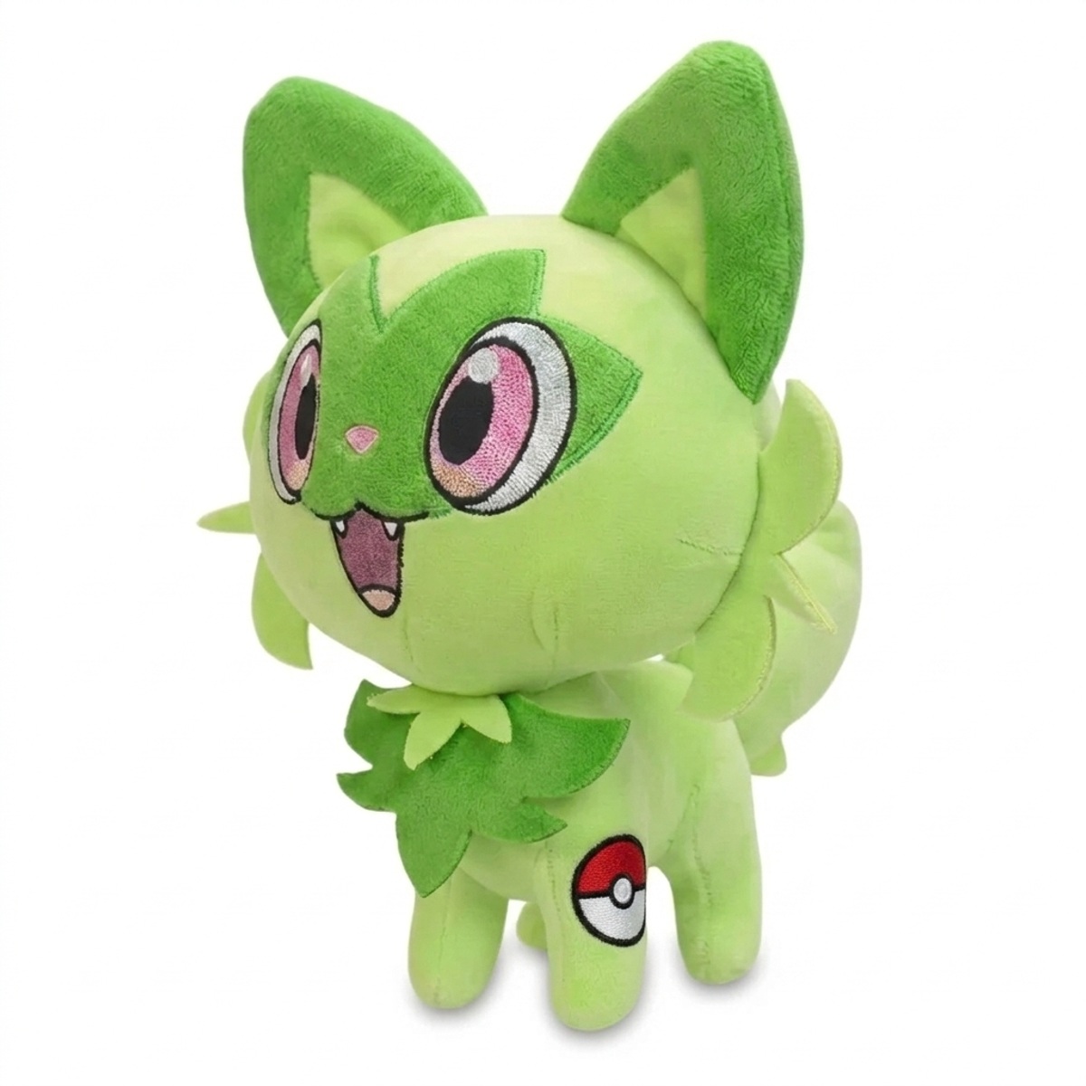Peluche Poussacha avec badge prouvant l'authenticité du produit.