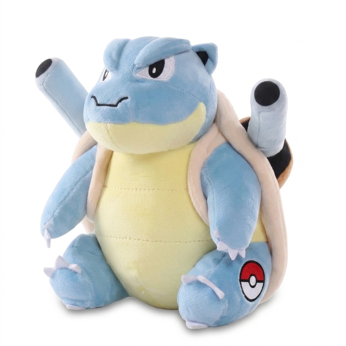 Peluche Tortank avec badge prouvant l'authenticité du produit.