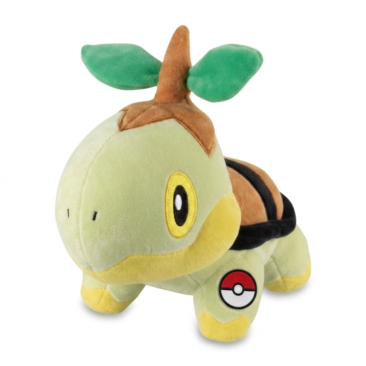 Peluche Tortipouss avec badge prouvant l'authenticité du produit.