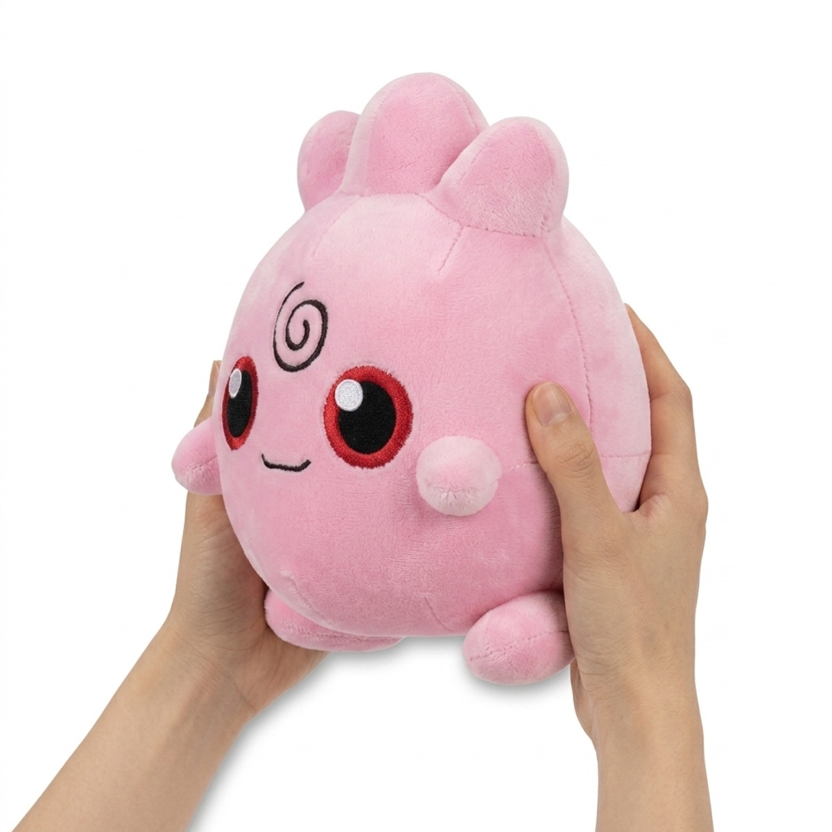 Peluche Toudoudou tenue dans les mains