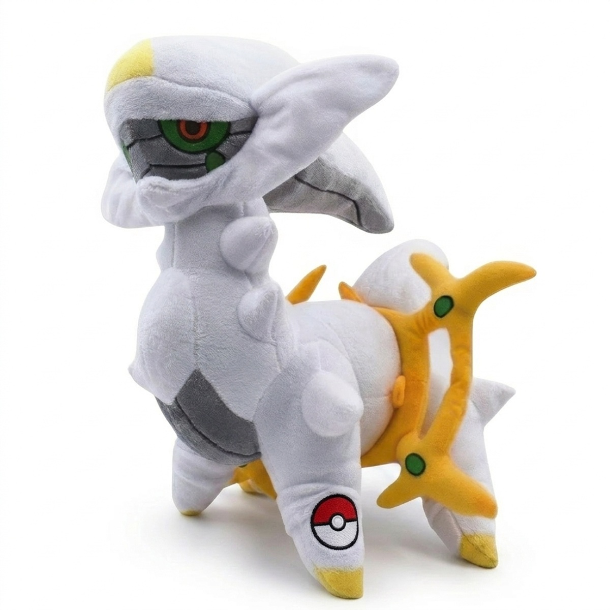 Peluche Arceus avec badge prouvant l'authenticité du produit.