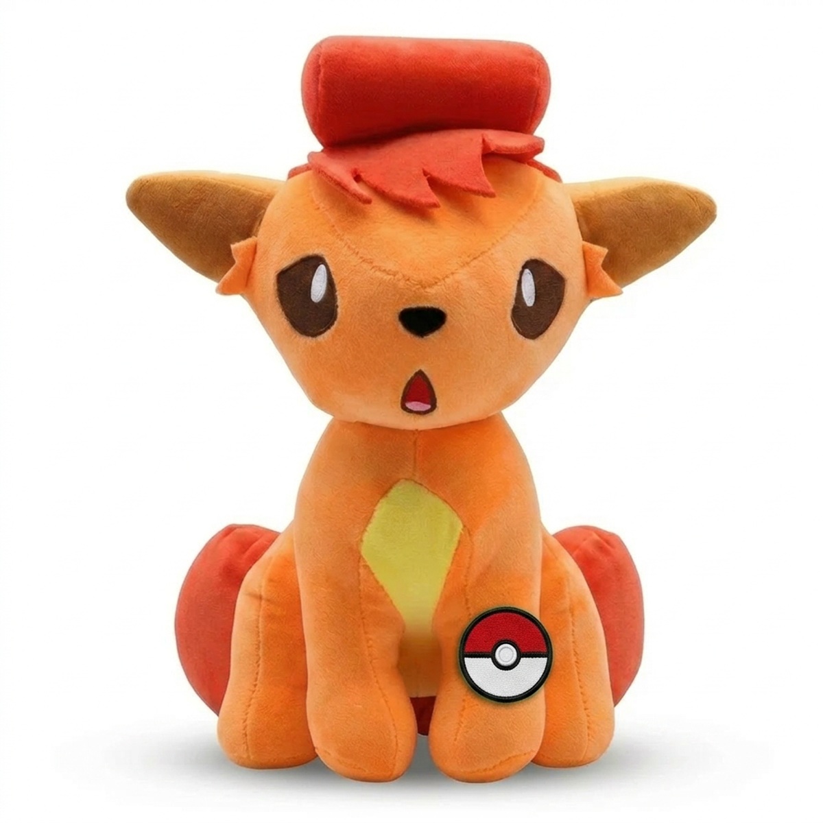 Peluche Goupix avec badge prouvant l'authenticité du produit.