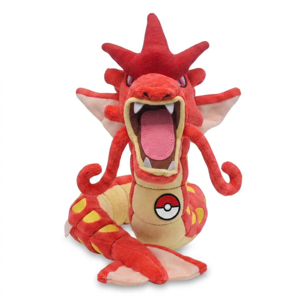 Peluche Léviator avec badge prouvant l'authenticité du produit.