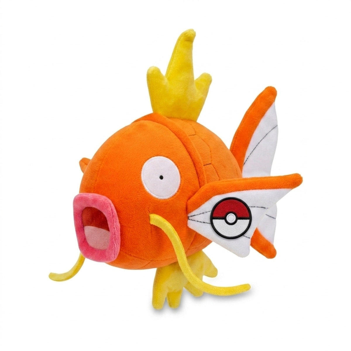 Peluche Magicarpe avec badge prouvant l'authenticité du produit.