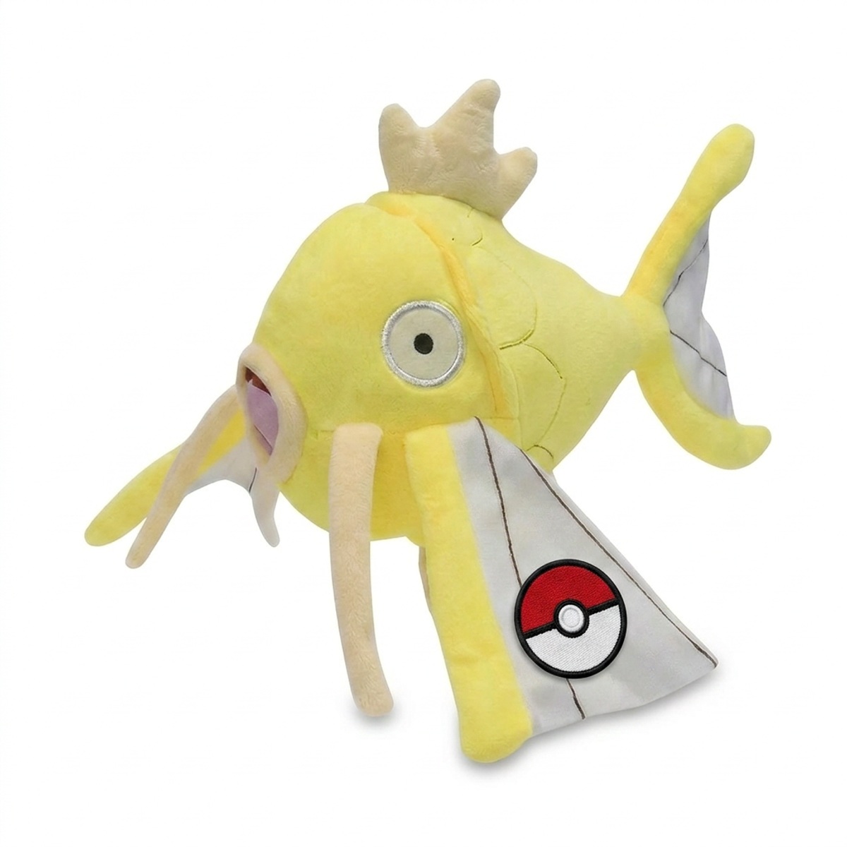 Peluche Magicarpe avec badge prouvant l'authenticité du produit.