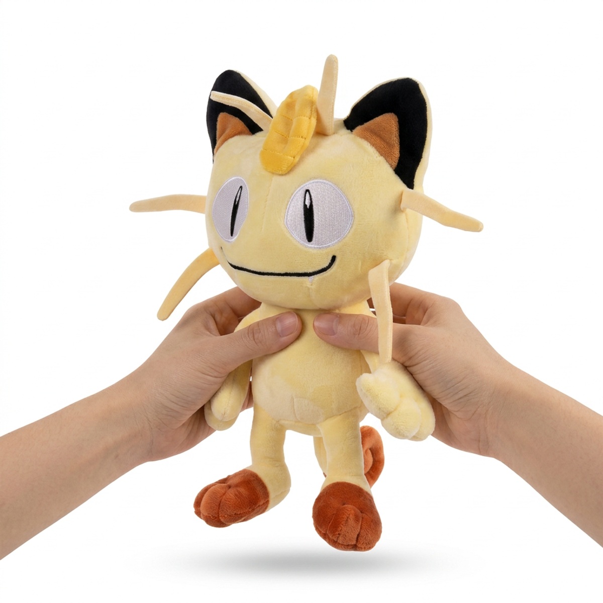 Peluche Miaouss tenue dans les mains