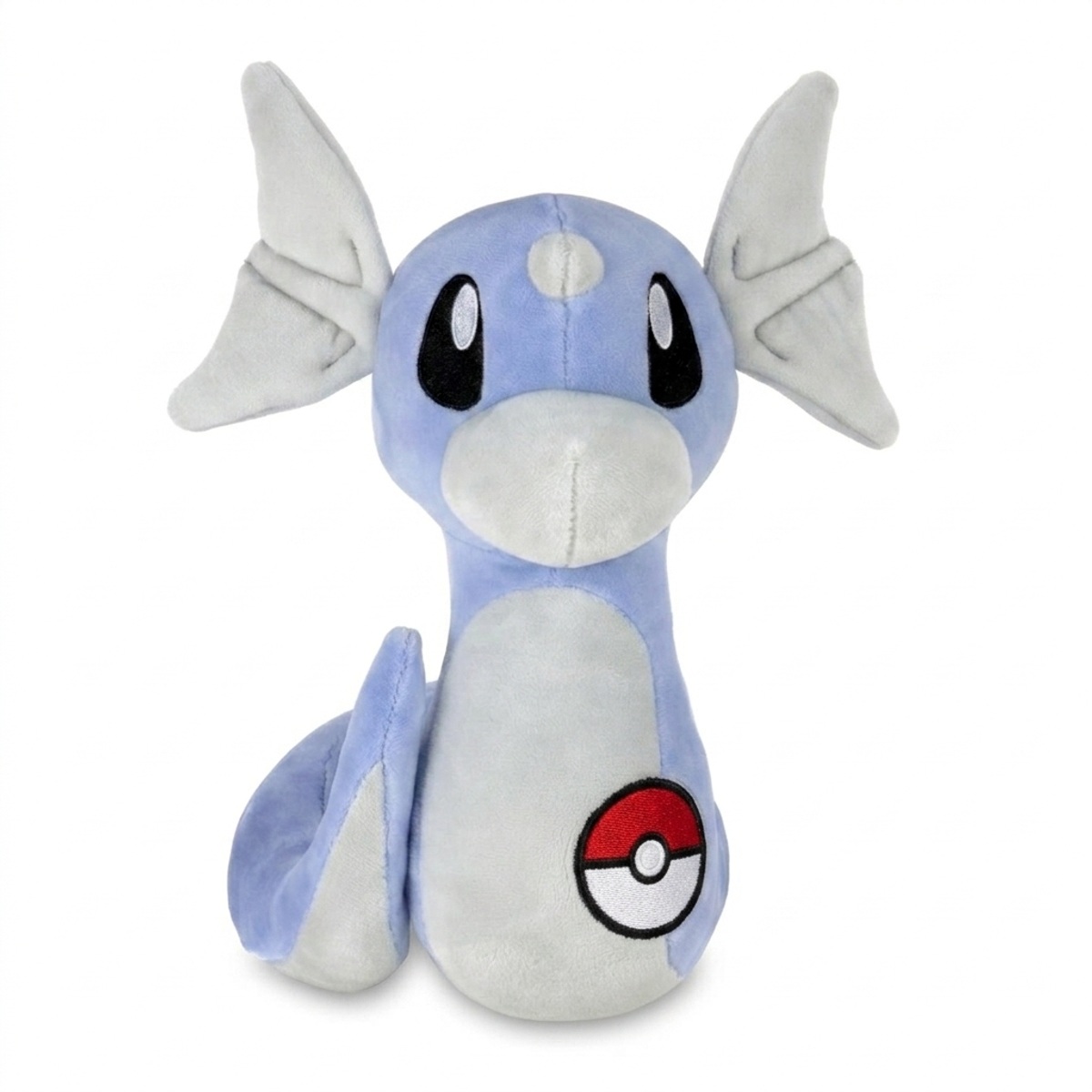 Peluche Minidraco avec badge prouvant l'authenticité du produit.