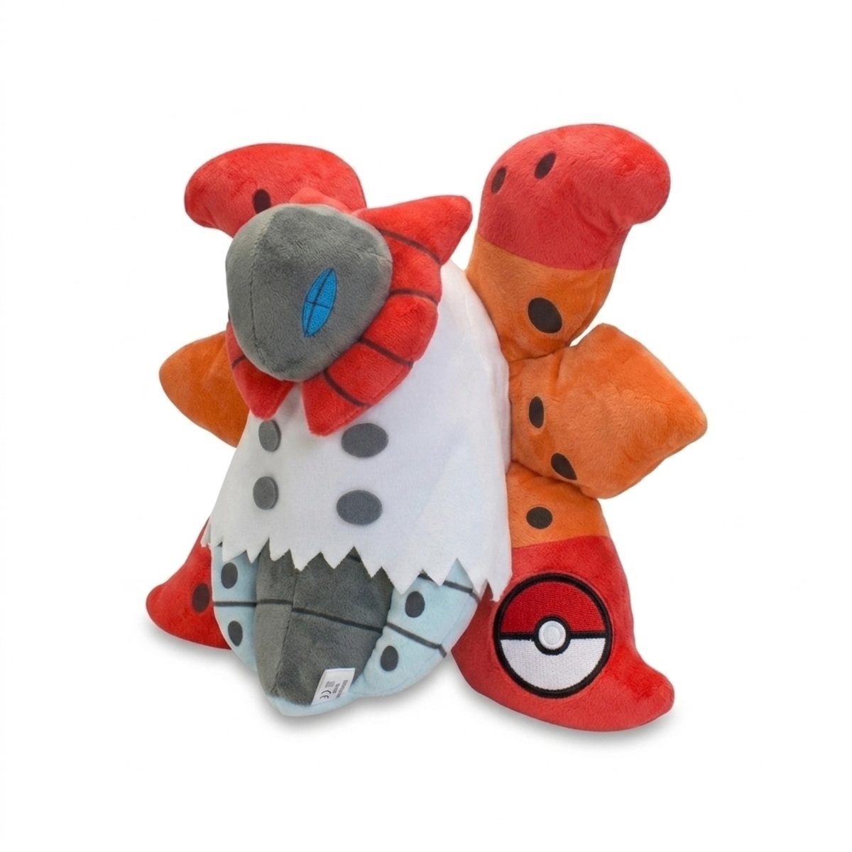 Peluche Pyrax avec badge prouvant l'authenticité du produit.