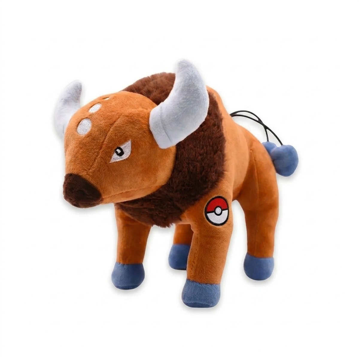 Peluche Tauros avec badge prouvant l'authenticité du produit.
