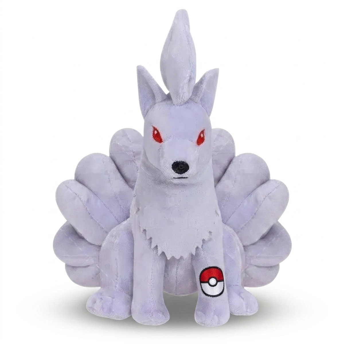 Peluche Feunard avec badge prouvant l'authenticité du produit.