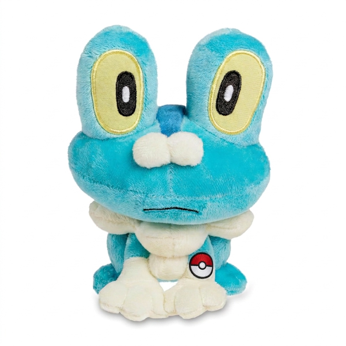 Peluche Grenousse avec badge prouvant l'authenticité du produit.