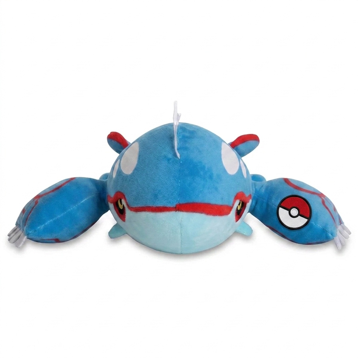 Peluche Kyogre avec badge prouvant l'authenticité du produit.