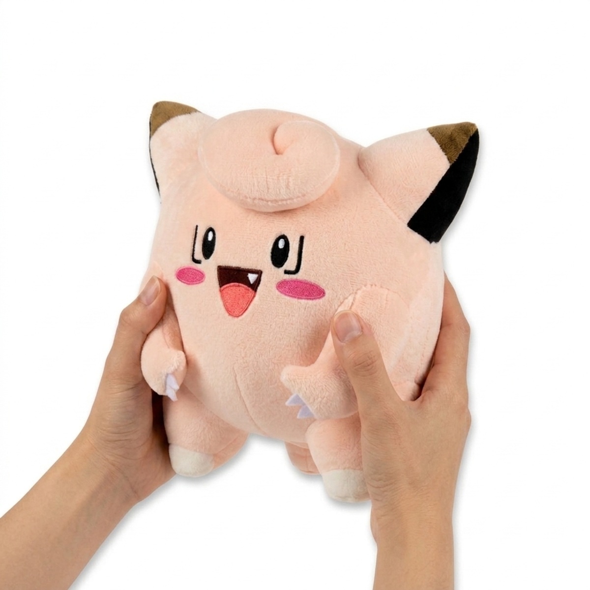 Peluche Mélofée tenue dans les mains