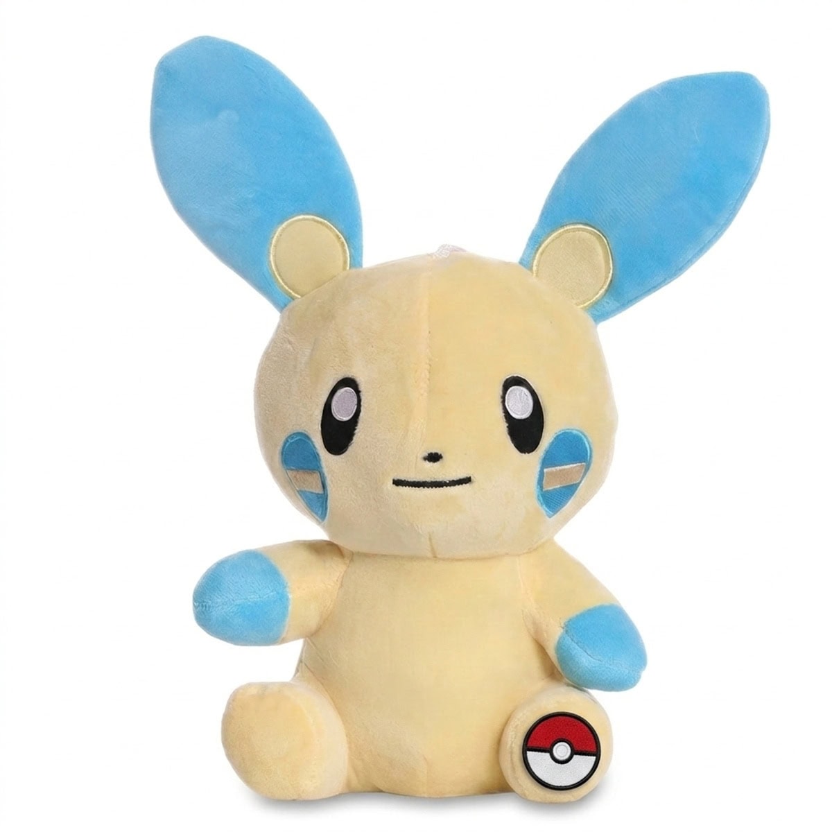 Peluche Négapi avec badge prouvant l'authenticité du produit.