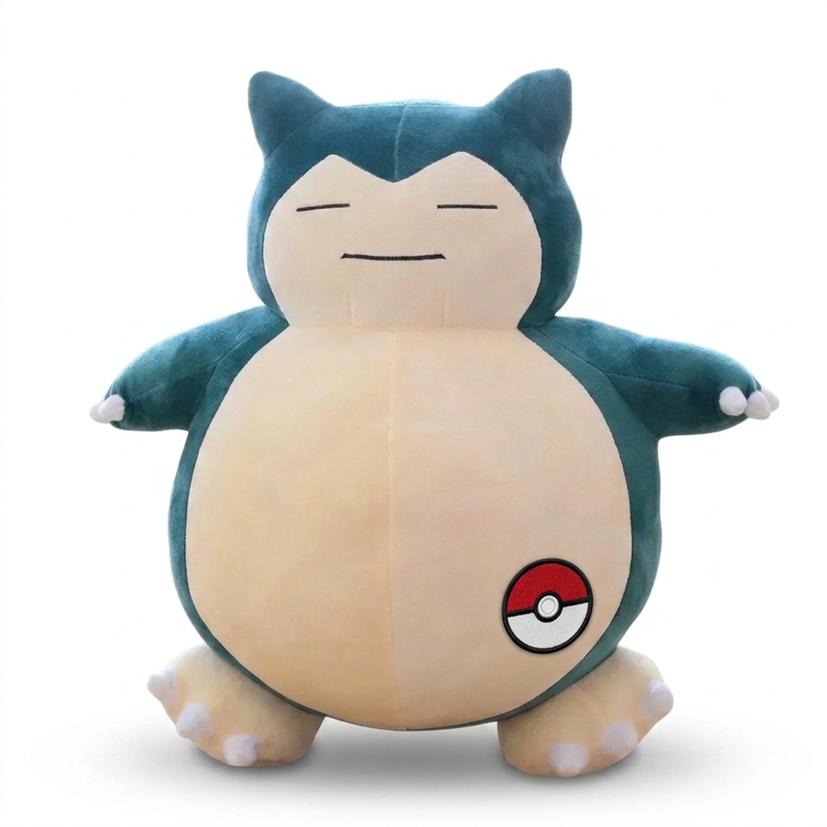 Peluche Ronflex Géante avec badge prouvant l'authenticité du produit.