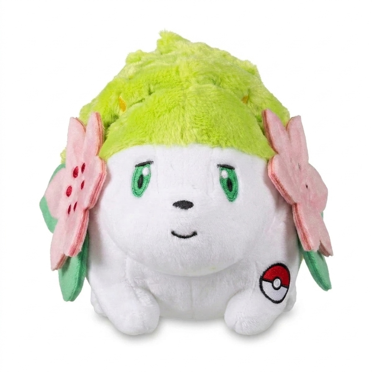 Peluche Shaymin avec badge prouvant l'authenticité du produit.