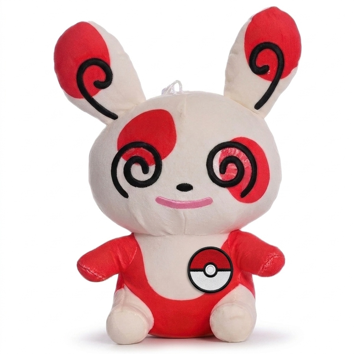 Peluche Spinda avec badge prouvant l'authenticité du produit.