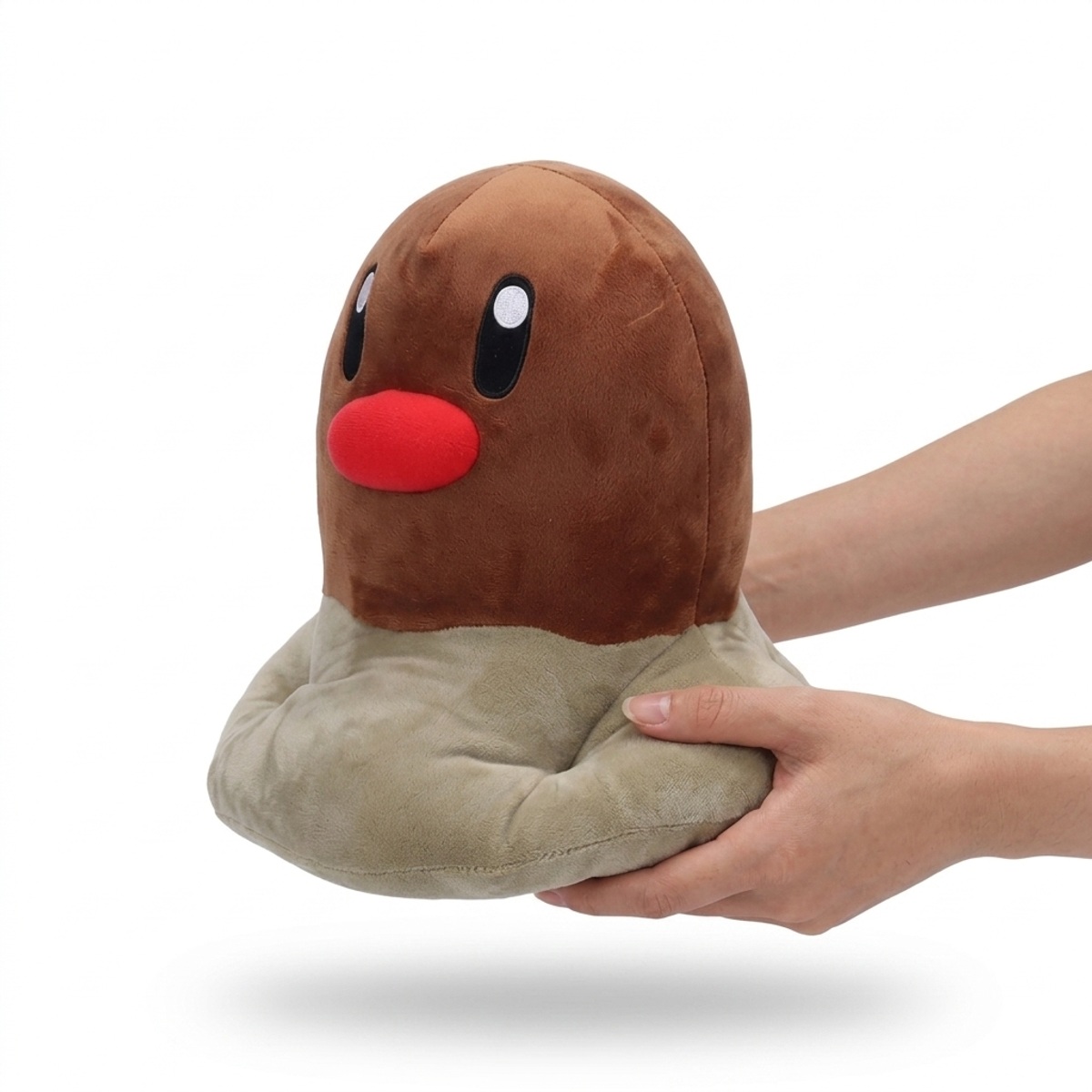 Peluche Taupiqueur tenue dans les mains