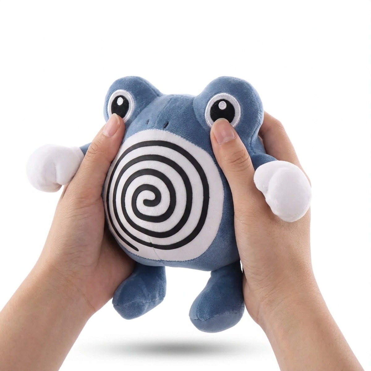 Peluche Têtarte tenue dans les mains