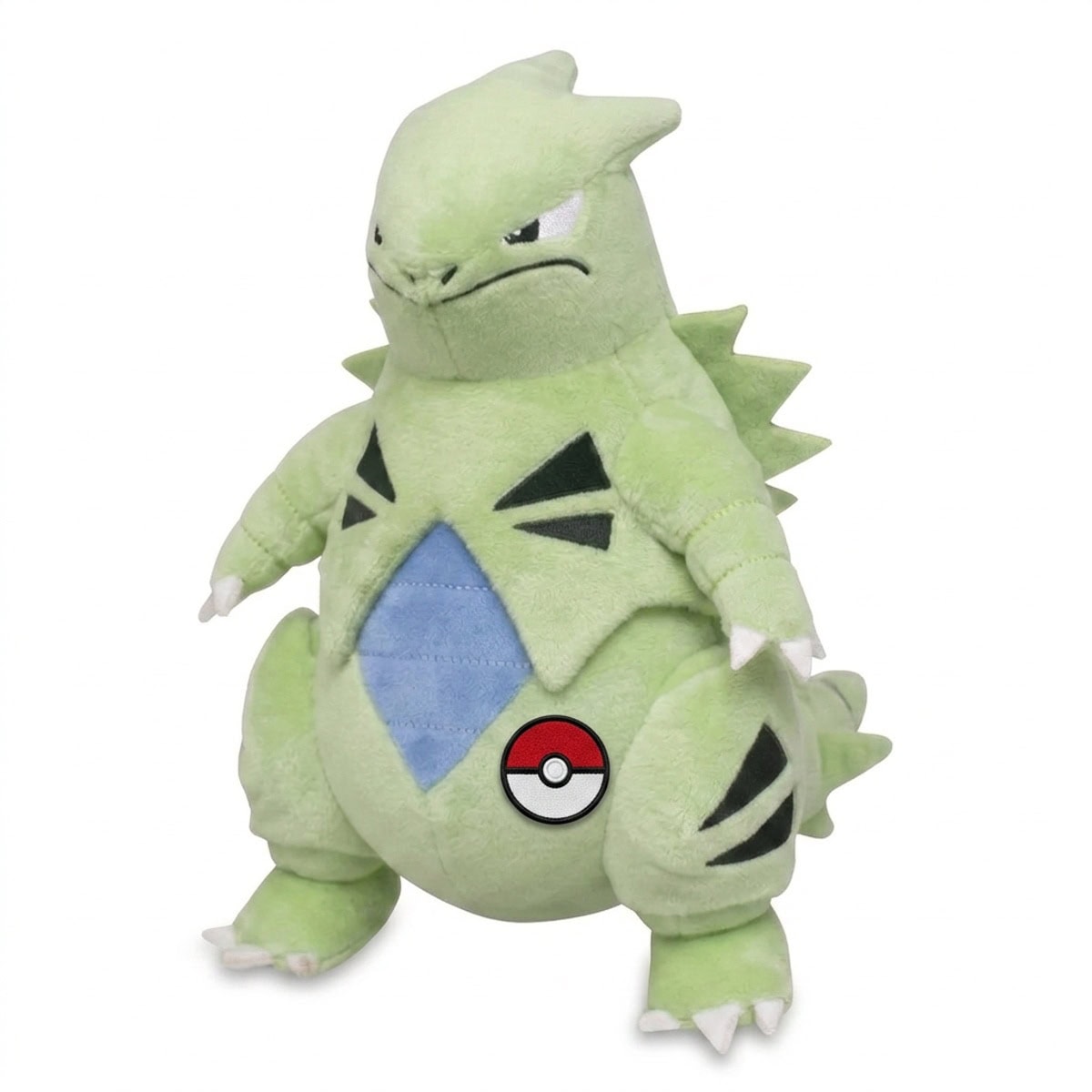 Peluche Tyranocif avec badge prouvant l'authenticité du produit.